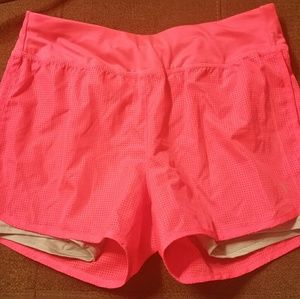 Bright pink workout shorts